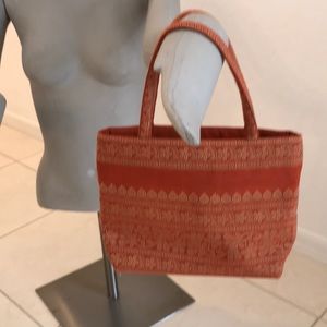 Small Burnt Orange pocketbook.